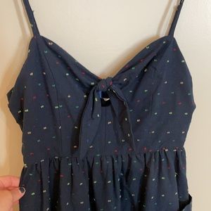 Midi-tea length dress with tie front and peep hole